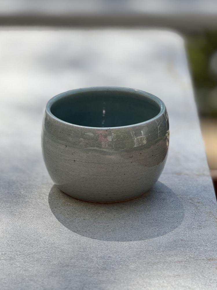 Pale blue bowl/cup, handmade by Suzanne Luna