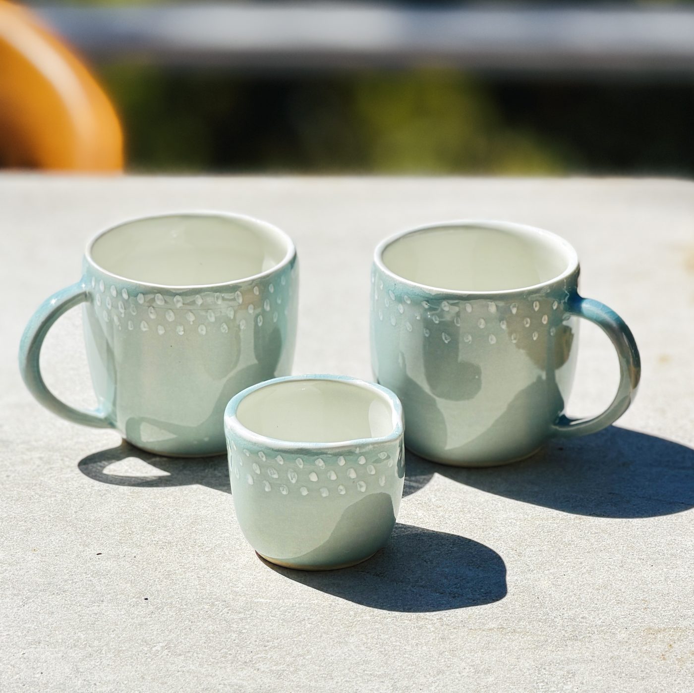 Porcelain trio pair of pale blue mugs plus creamer- hand painted dots, handmade by Suzanne Luna