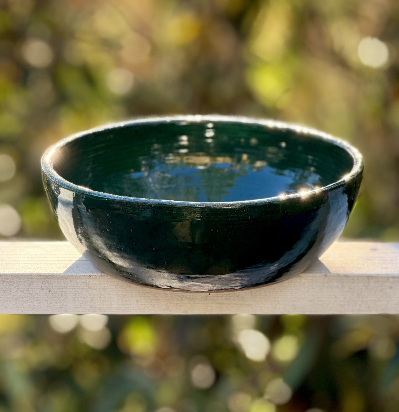 Extra Large teal speckled bowl, two white hearts, handmade by Suzanne Luna