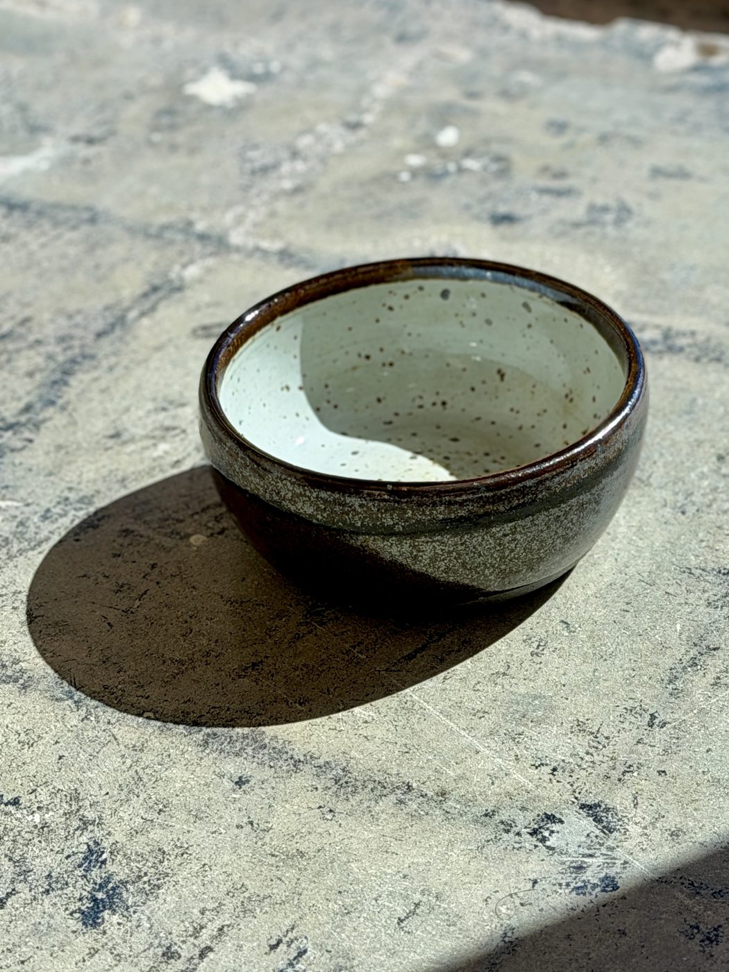 Stoneware medium White and Brown bowl on black clay, handmade by Suzanne Luna